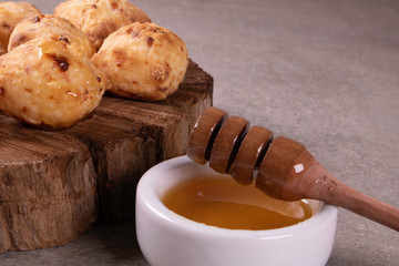 typical Brazilian snack: tapioca dumpling with honey