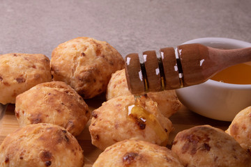 typical Brazilian snack: tapioca dumpling with honey