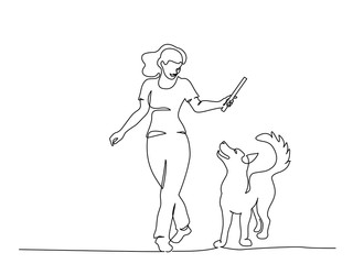 Woman training dog with stick. Continuous one line art