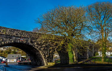 A view across the railway viaduct in the seaside town of Tenby, Pembrokeshire on a sunny day