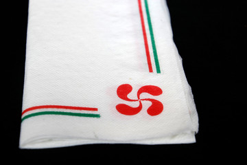 Paper napkin with a Basque cross