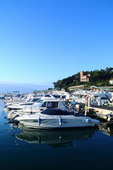 Obraz premium Boats moored inside the tourist port of Varazze.. Varazze is about 30 kilometers from Genoa and makes nautical tourism i