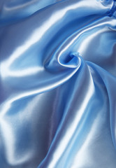 folds of silk airy light blue color, top view