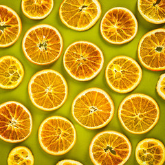 Obraz premium Dry Oranges Slices Snack. Dry Oranges for Christmas Decorations. Selective focus.