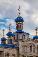 Fototapeta na wymiar Picturesque domes of the Kislyakovskaya Church of the Nativity of the Blessed Virgin Mary (Krasnodar Territory, Russia)