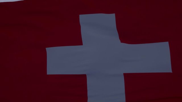 Switzerland flag waving in the wind. Realistic flag background. Thundercloud background