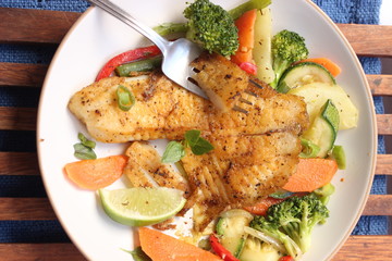 Fish steak with garlic and veggies