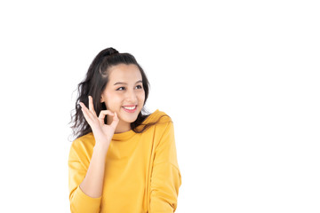 Asian young woman showing okay gesture on isolate white background