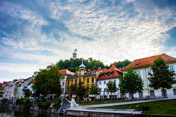 View to the City and a castle of Ljubljana during a day with a dramatic sky