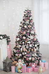 Green and White Christmas tree with pink toys new year winter gifts decor