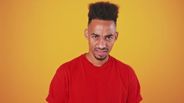 Aggressive african american man raising middle finger