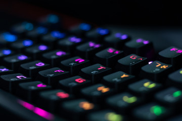 Gaming RGB keyboard keys with blurred background