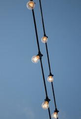 Retro garland on sky background