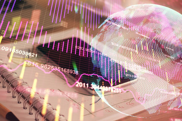 Double exposure of forex chart drawing and cell phone background. Concept of financial data analysis