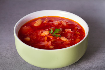 Soup made with vegetables, meat, bean and beet root: borsht, bortsch, borshch, borscht. Traditional dish in Ukraine, Russia, Poland