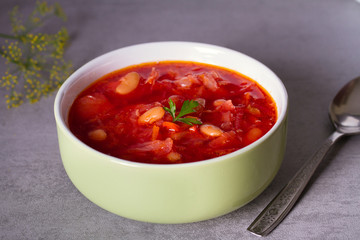 Soup made with vegetables, meat, bean and beet root: borsht, bortsch, borshch, borscht. Traditional dish in Ukraine, Russia, Poland