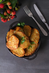 Potato Cakes. Vegetable fritters, latkes, draniki. Vegetable pancakes. View from above, top studio shot