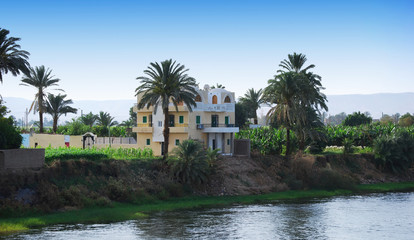 Buildings and landscape on the coastline of the Nile river. Egypt
