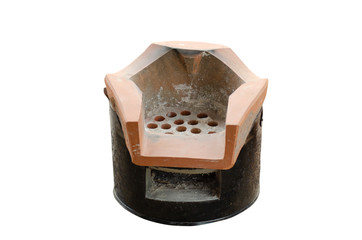 Charcoal and wood fire stove isolated from white background.