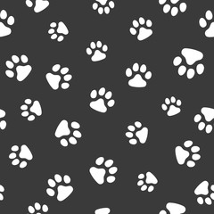 Vector, seamless pattern. Abstraction,, white traces of paws of a cat, dog on a dark gray background. For prints, packaging, social media, web.