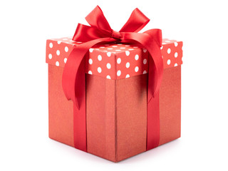 Red polka dots gift box with bow isolated on white