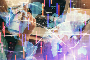 Double exposure of man and woman working together and financial theme hologram. international business concept. Computer background.