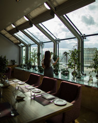 young woman in a cafe