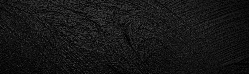 Panoramic background - old dark concrete wall with cracks