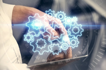 Fototapeta premium Double exposure of man's hands holding and using a phone and international business theme drawing.