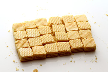 A wafer is a crisp, often sweet, very thin, flat, light and dry biscuit