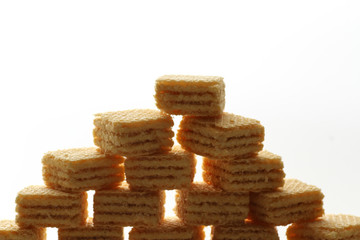 A wafer is a crisp, often sweet, very thin, flat, light and dry biscuit