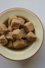 brown sugar cubes in bowl