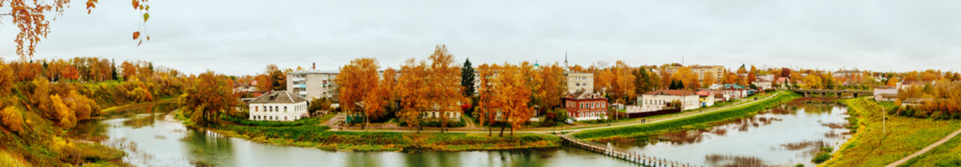 Fototapeta premium View of the provincial city from above. Rural autumn panoramic landscape.