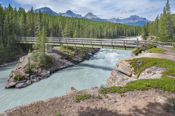 Pedestrian bridge over the North Saskatchewan River in Banff National Park, Alberta, Canada