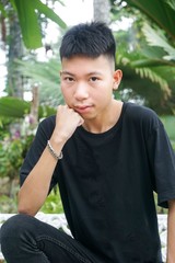 close up young man in nature garden