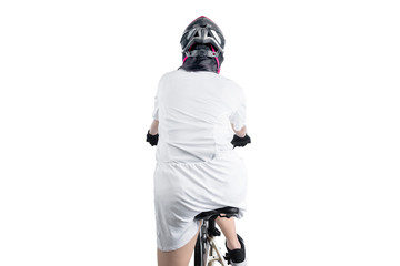 Rear view of Asian woman with a bicycle helmet riding a bicycle