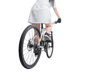 Rear view of a woman riding a bicycle