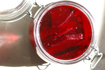 Sliced, spice pickled beetroot in a jar