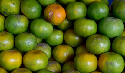 Closeup of Fresh ripe oranges for sale on a market in Thailand.