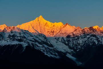 Kawagarbo at sunrise, the highest peak of the sacred snow mountain Meili in Yunnan, China