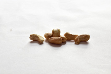 Fototapeta na wymiar Closeup of Cashew Nuts isolated on the white background, Full depth of field.