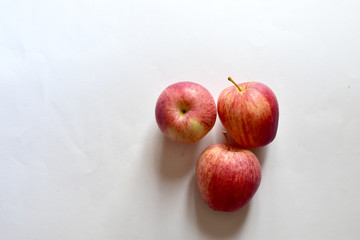 Fresh Red Apples isolated on white background and pattern selective focus and shallow depth of field.