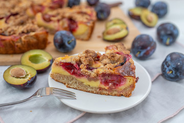 sweet home made plum crumble pie on a table