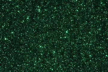 Green Sparkling Lights Festive background with texture. Abstract Christmas twinkled bright bokeh defocused and Falling stars. Winter Card or invitation	