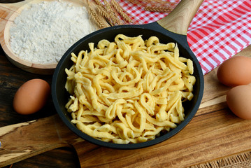 Spätzle  are a kind of soft egg noodle  also Spätzli or Chnöpfli in Switzerland or Knöpfle or Hungarian Nokedli, Csipetke or Galuska