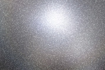 Shimmer pattern on gloss metal texture. Polished material background.