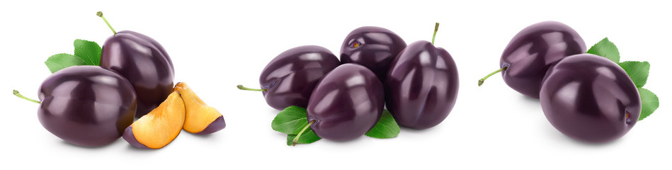 fresh purple plum and slices with leaves isolated on white background with clipping path and full depth of field. Set or collection