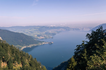 Fototapeta na wymiar Traunsee lake with alps mountain and city Traunkirchen from lookout Aussichtsplatz Spitzlsteinalm. Austria landscape