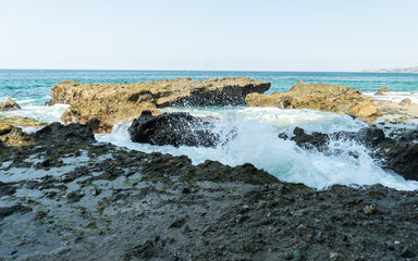 Fototapeta na wymiar Waves Splashing on the California Coast