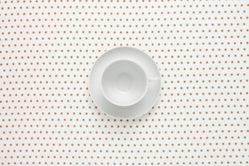 coffee cup on dot pattern paper